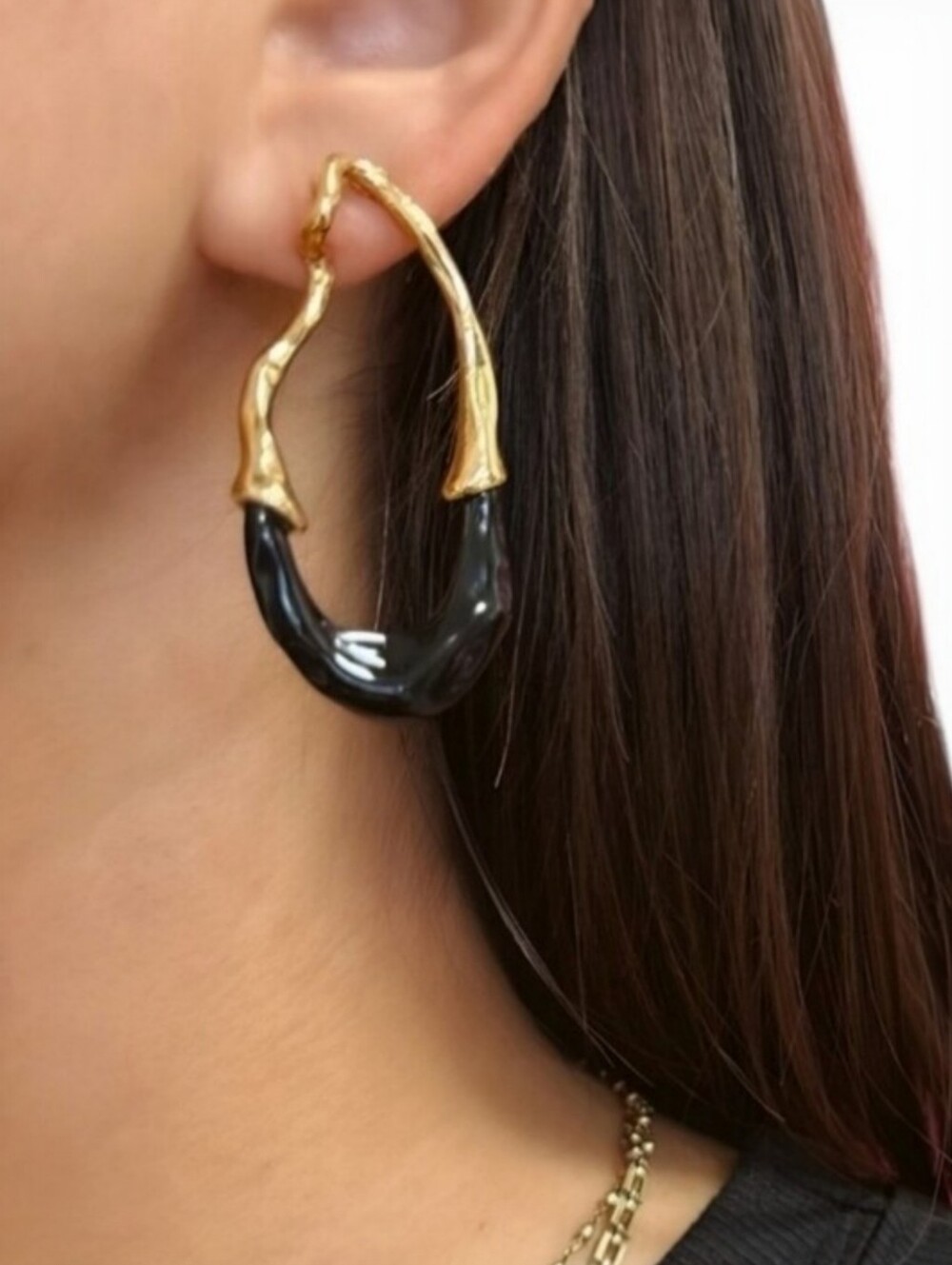 Black enamel and gold drip dangle earrings; nwot